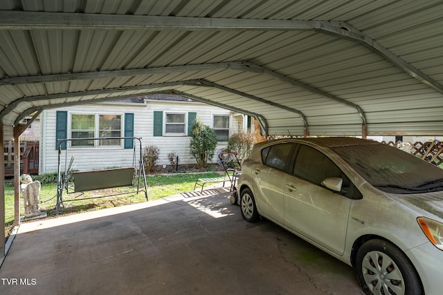 garage featuring a carport