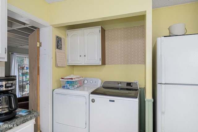 laundry area featuring independent washer and dryer