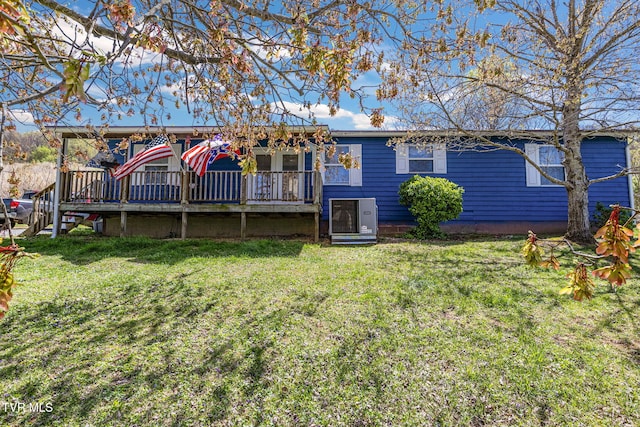 10955 Middle Wallens Creek Rd, Jonesville, VA 24263 - rear view of property featuring a deck and a lawn