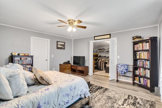 10955 Middle Wallens Creek Rd, Jonesville, VA 24263 - bedroom featuring a ceiling fan, wood finished floors, a closet, and a spacious closet