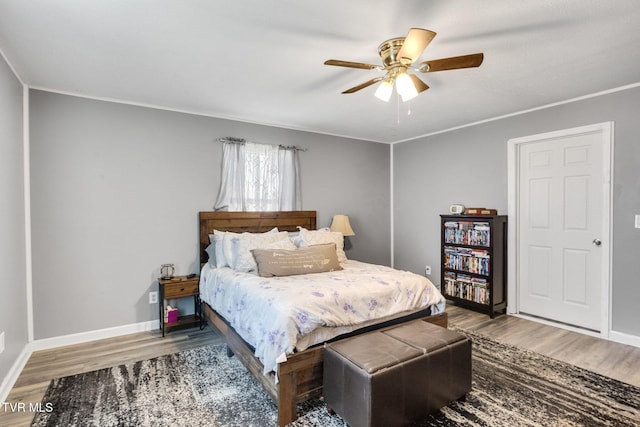 10955 Middle Wallens Creek Rd, Jonesville, VA 24263 - bedroom featuring wood finished floors, ceiling fan, and baseboards
