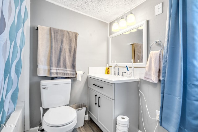 10955 Middle Wallens Creek Rd, Jonesville, VA 24263 - bathroom with toilet, a textured ceiling, wood finished floors, and vanity