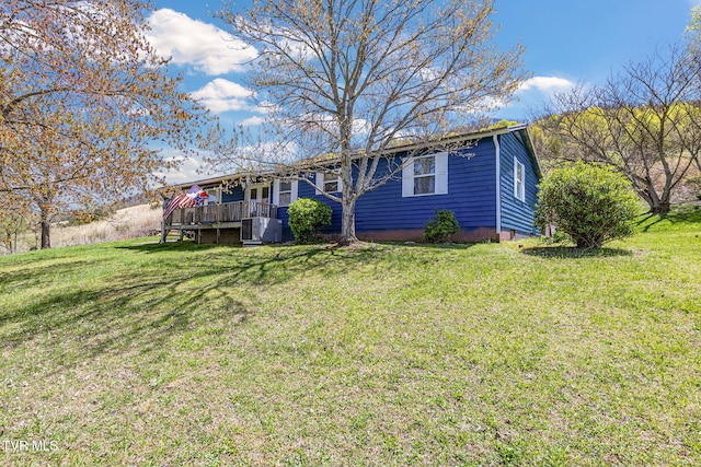 10955 Middle Wallens Creek Rd, Jonesville, VA 24263 - rear view of house with a deck, cooling unit, and a lawn