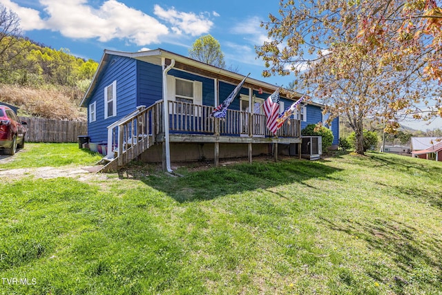10955 Middle Wallens Creek Rd, Jonesville, VA 24263 - back of property featuring a yard and fence