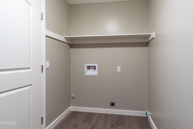 clothes washing area with laundry area, baseboards, dark wood-type flooring, washer hookup, and electric dryer hookup