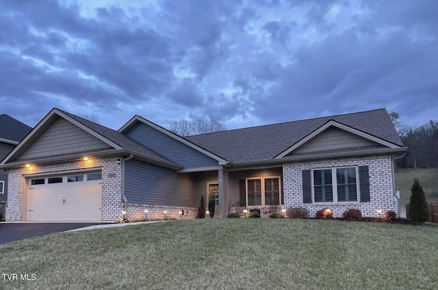 craftsman-style home with a front lawn and a garage