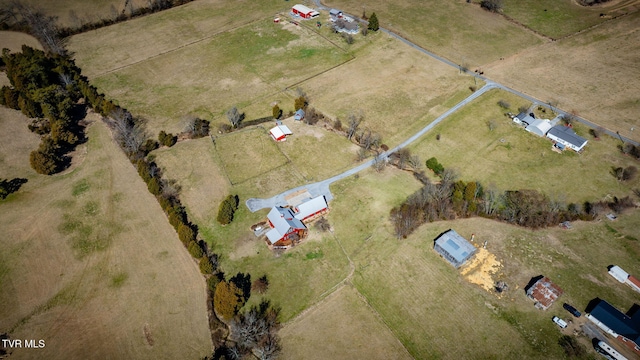 birds eye view of property featuring a rural view