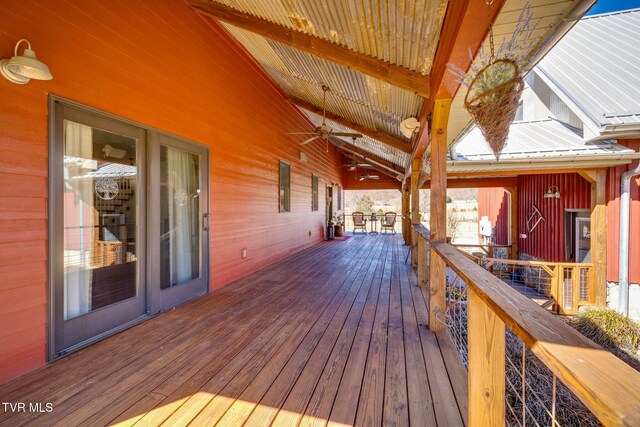 wooden terrace featuring ceiling fan