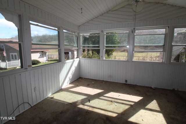 unfurnished sunroom with vaulted ceiling