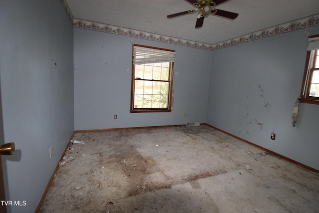 spare room featuring ceiling fan