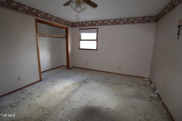 unfurnished bedroom with ceiling fan and a closet