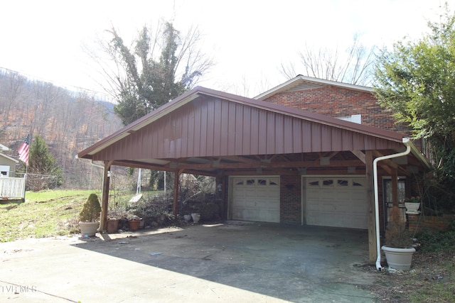 view of side of property featuring a garage