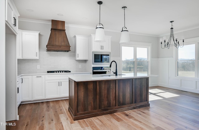 294 River Pointe Dr, Greeneville, TN 37743 - kitchen featuring light countertops, custom range hood, black cooktop, a sink, and built in microwave