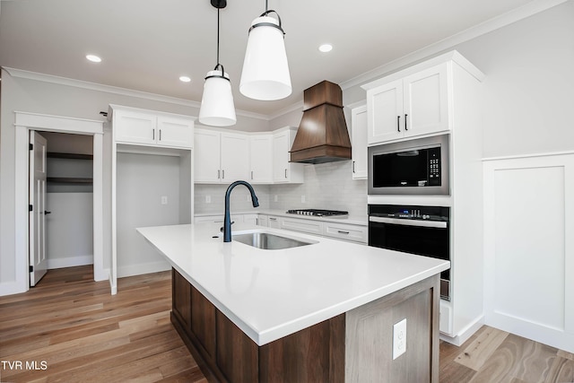 294 River Pointe Dr, Greeneville, TN 37743 - kitchen featuring light wood finished floors, custom exhaust hood, a sink, built in microwave, and oven
