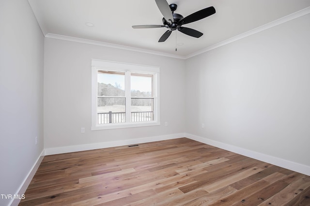 294 River Pointe Dr, Greeneville, TN 37743 - spare room with visible vents, crown molding, baseboards, and wood finished floors