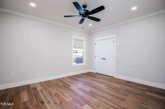 294 River Pointe Dr, Greeneville, TN 37743 - unfurnished room featuring baseboards, ornamental molding, wood finished floors, and recessed lighting