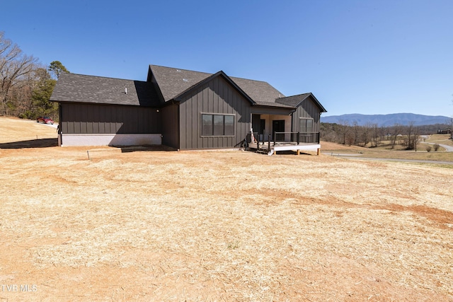 294 River Pointe Dr, Greeneville, TN 37743 - view of front of house with a shingled roof, a mountain view, and board and batten siding