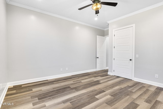 spare room with baseboards, a ceiling fan, ornamental molding, wood finished floors, and recessed lighting