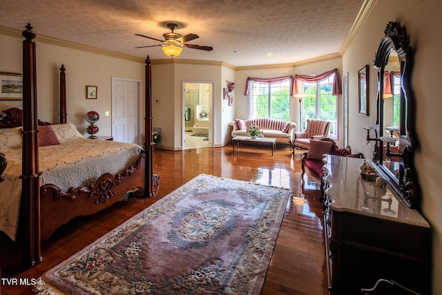 bedroom featuring ornamental molding, dark wood finished floors, and a textured ceiling