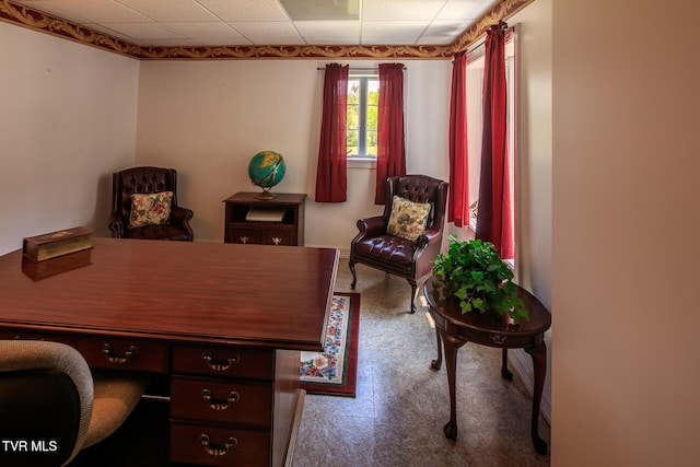 home office with a drop ceiling