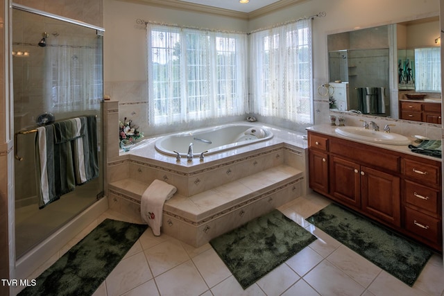 bathroom with plenty of natural light, vanity, and tile patterned floors