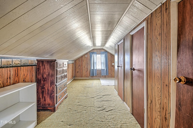 bonus room featuring carpet, wooden ceiling, vaulted ceiling, and wooden walls