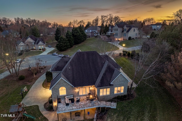 aerial view at dusk with a residential view