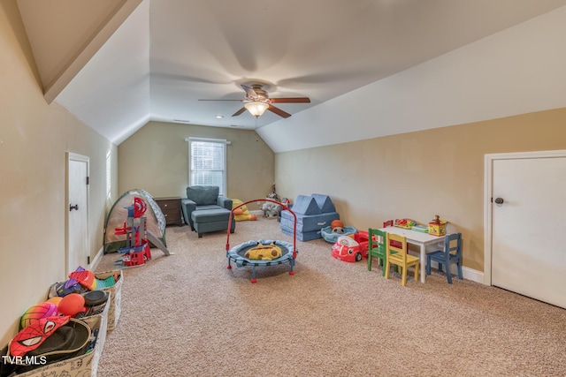 playroom featuring baseboards, a ceiling fan, vaulted ceiling, and carpet flooring