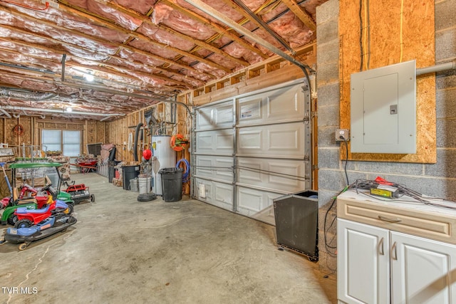 garage with water heater and electric panel