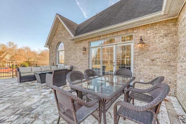 view of patio featuring outdoor dining area and an outdoor living space