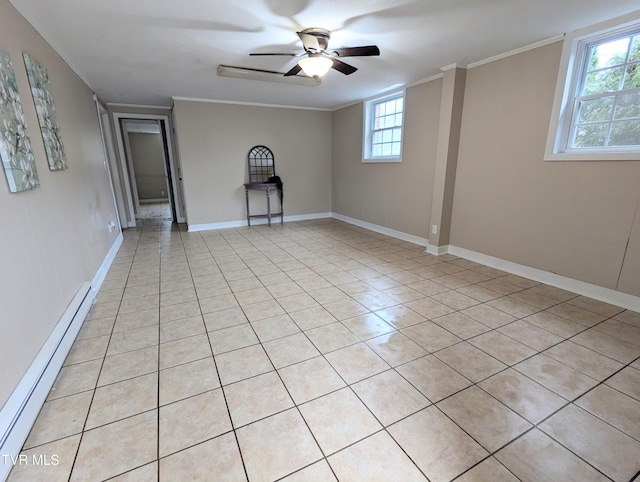 tiled spare room with a baseboard heating unit, crown molding, and ceiling fan