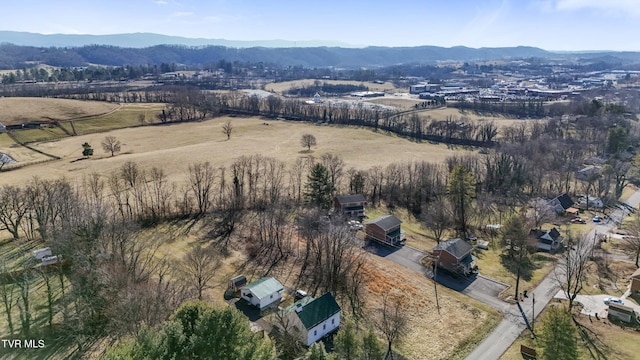 drone / aerial view featuring a mountain view