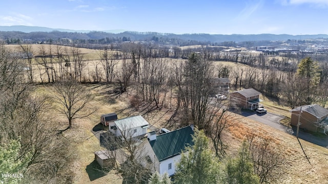 drone / aerial view featuring a mountain view