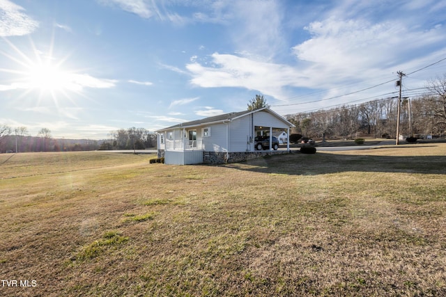 view of property exterior featuring a yard