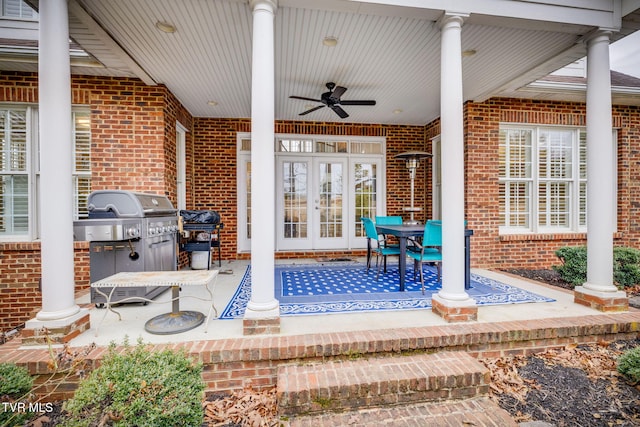 view of patio / terrace with french doors, grilling area, and a ceiling fan