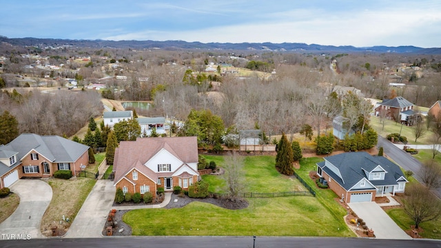 aerial view with a mountain view and a residential view