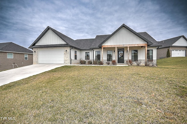 view of front of house featuring a front lawn, a porch, and a garage