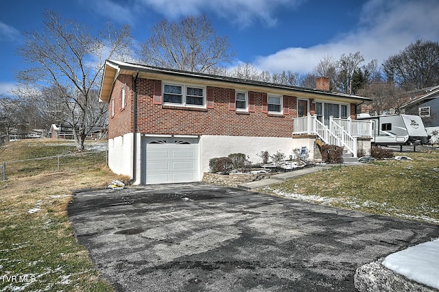 view of front of property featuring driveway, a chimney, an attached garage, fence, and brick siding