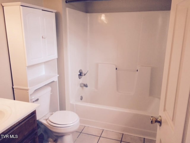 full bathroom featuring tile patterned flooring, shower / tub combination, vanity, and toilet