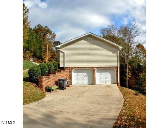 view of home's exterior featuring a garage