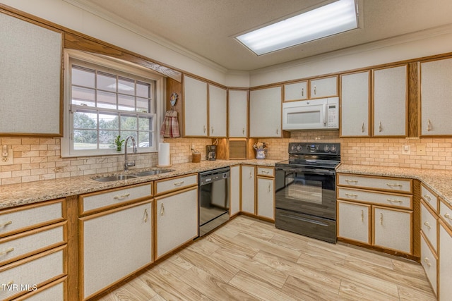 305 Overbrook Dr, Bristol, TN 37620 - kitchen featuring a sink, black appliances, light countertops, and backsplash