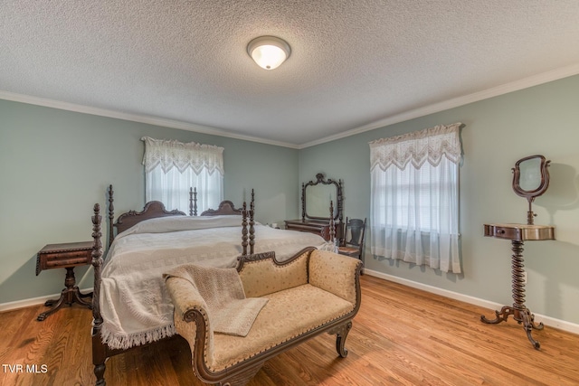 305 Overbrook Dr, Bristol, TN 37620 - bedroom with baseboards, ornamental molding, and light wood-style floors