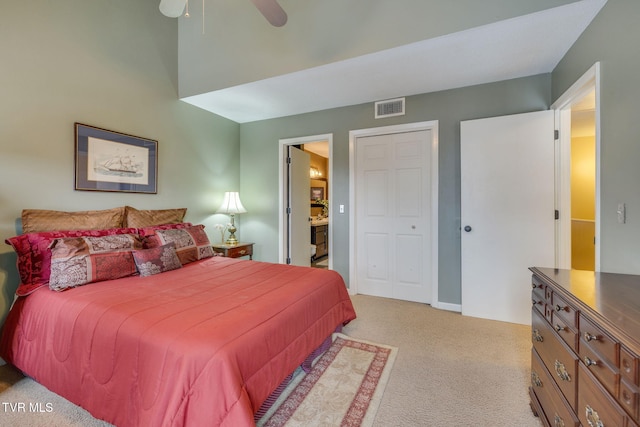 bedroom featuring ceiling fan, light carpet, visible vents, baseboards, and a closet