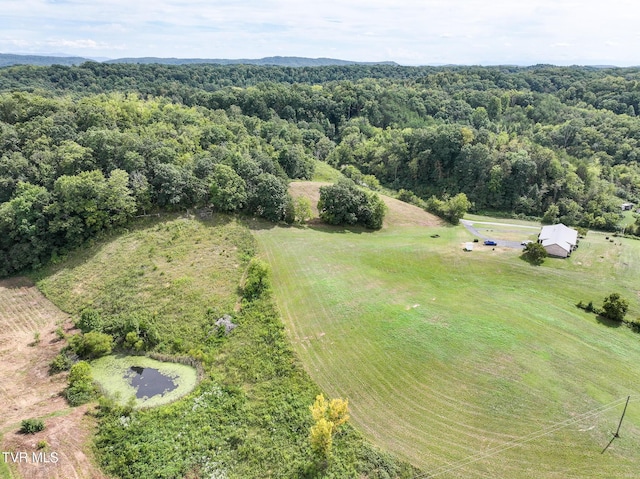 birds eye view of property featuring a rural view