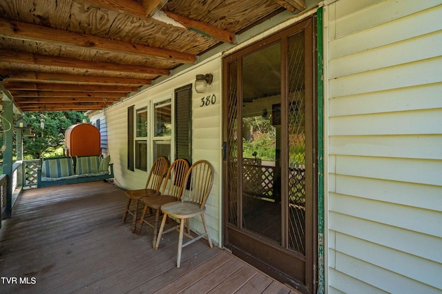 deck featuring covered porch