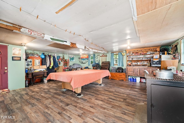 recreation room with pool table and wood finished floors