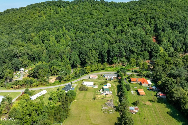 aerial view featuring a view of trees