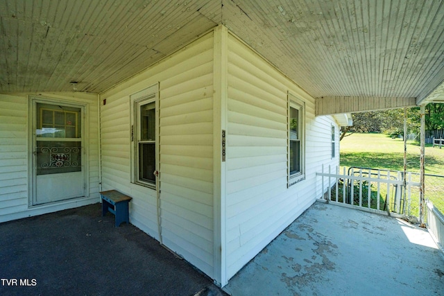 view of property exterior featuring a porch