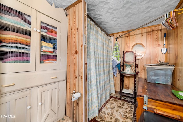 interior space featuring wood walls