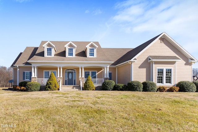 view of front facade with a porch and a front yard